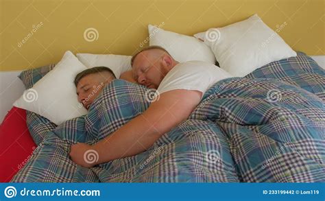 Two Guys Sleep In One Bed In Room Recovery Time Of A Person In A Dream Stock Photo Image Of