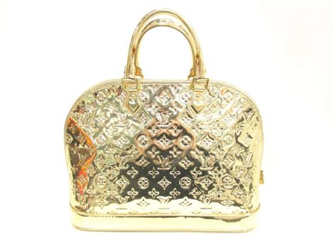 louis vuitton gold miroir alma bag cinemas 93