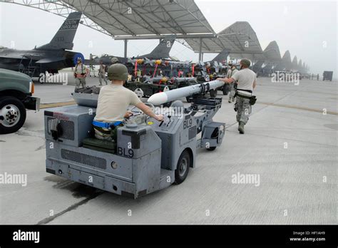 Us Air Force Weapons Loader With The 169th Maintenance Squadron Of