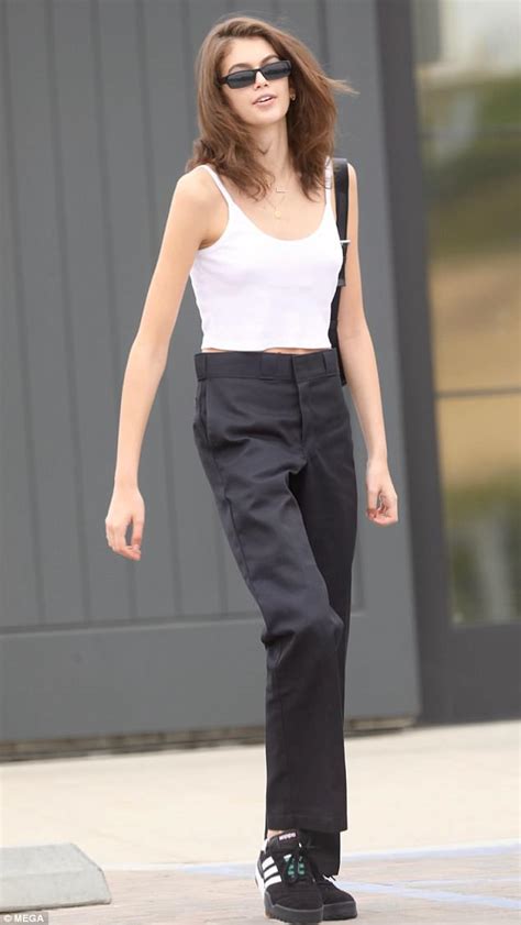 Kaia Gerber Stuns In White Vest Top And High Waisted Black Trousers