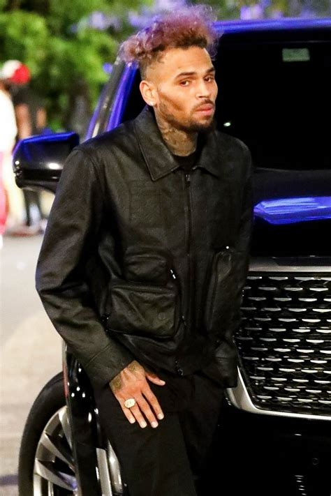 Chris Brown Looks Unrecognizable In New Photos From Drakes Billboard