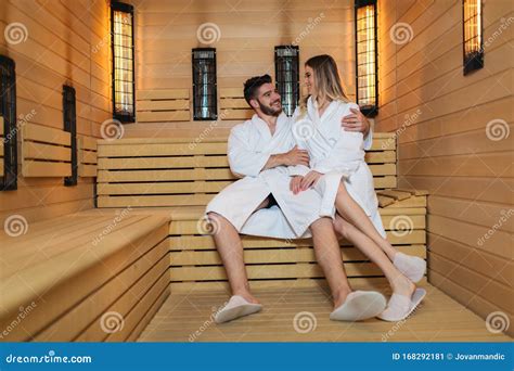 Couple In Bathrobes Using Sauna At Spa Resort Stock Image Image Of