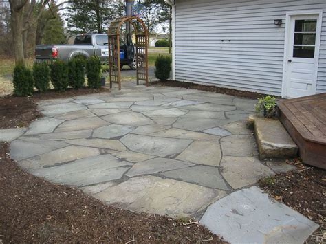 Lay out the individual stones, adjusting for the best fit and keeping the gaps between stones consistent. #patio I like the look of this stone for my patio redo ...