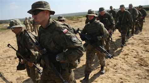 poland plans paramilitary force of 35 000 to counter russia bbc news