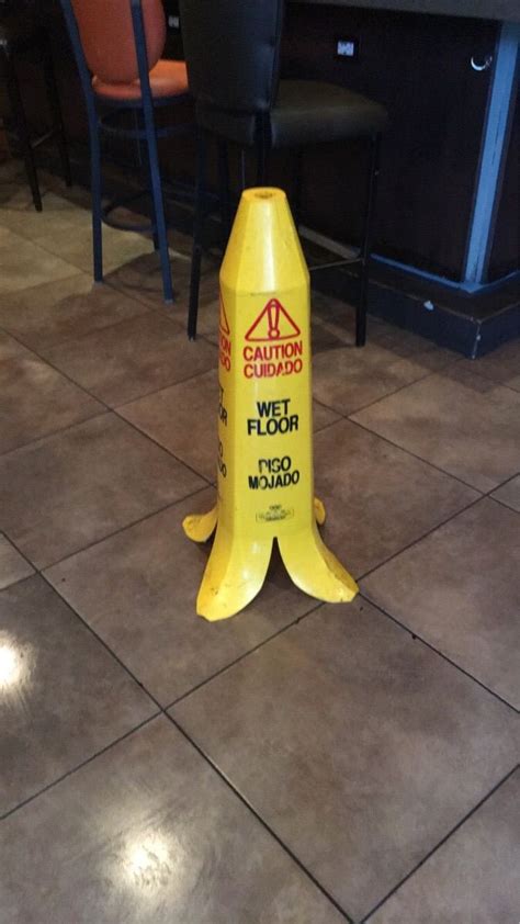 Carpet liquidators express seattle wa 2020. Wet floor sign looks like banana peel. Found in Las Vegas ...