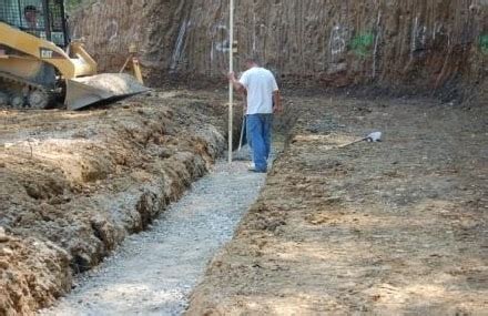 Site should be cleared and levelled. Construction of Concrete Block Retaining Walls with Steps
