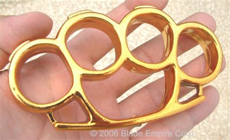 Plastic Brass Knuckles Medium Gold