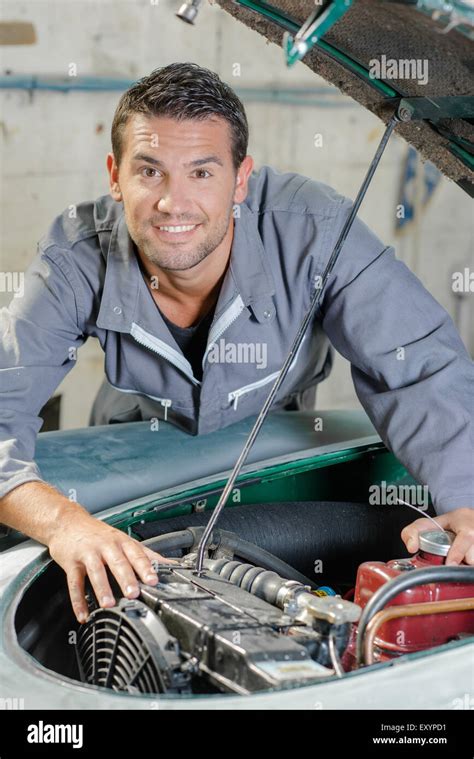 Man Trying To Fix His Car Stock Photo Alamy