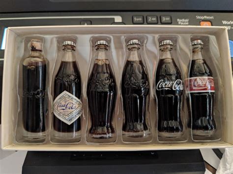 Coca Cola Evolution Of The Contour Bottle Set Of 6 Mini Bottles