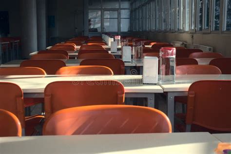 Close Up Shot Of Empty Seats Of A Cafeteria After The Closing Of