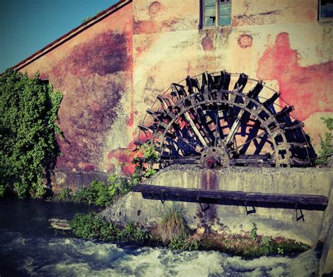 Big Wheel Of An Abandoned Water Mill With Vintage Effect Stock Image