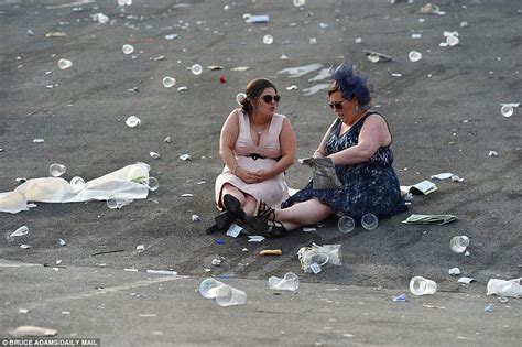 The Aftermath Two Women Sit Alone In Aintree Surrounded By Litter