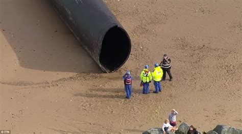 Beachgoers Shocked After Giant Pipes Wash Up On Uk Shores Daily Mail