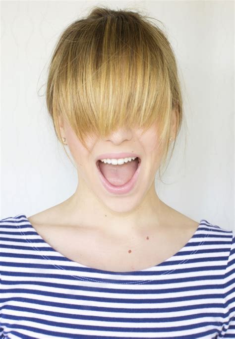 3 ways to style your bangs when they re in that pesky growing out stage growing out bangs