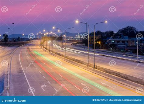 Car Light Trails On Motorway With Beautiful Skyscape At Twilight Stock