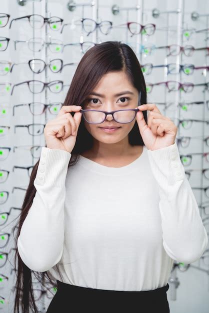 Premium Photo Young Asian Girl With Glasses
