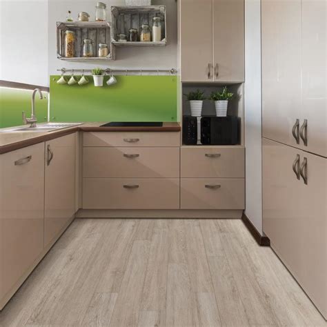 Both options are durable, resist kitchen spills and splashes, and are available in plenty of designs and textures. SMARTCORE 12-Piece 5-in x 48.03-in Cottage Oak Luxury ...