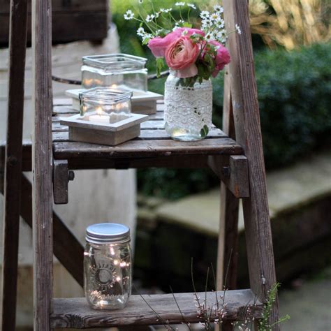 Perfect for storing paints, the artbin sidekick cube with paint palette has a removable palette tray and two dividers that notch together to create four small storage compartments. chunky glass candle holder on wooden tray by the wedding ...