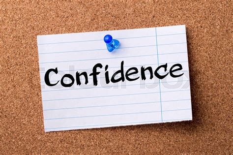 Confidence Teared Note Paper Pinned On Bulletin Board Stock Image