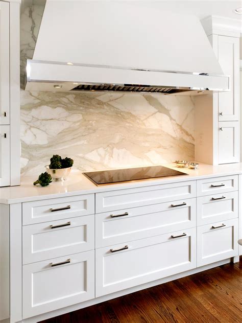 The hardware is amerock rochdale collection in graphite. Contemporary White Kitchen Cabinets with Marble Backsplash ...