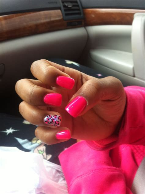Hot pink polish with cheetah print | Pink cheetah nails, Hot pink cheetah nails, Nail jewels