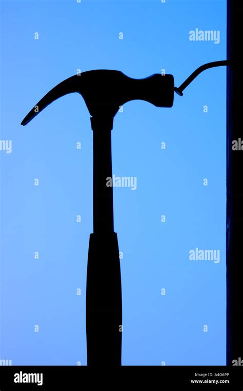 Silhouette Of A Hammer And Bent Nail Stock Photo Alamy