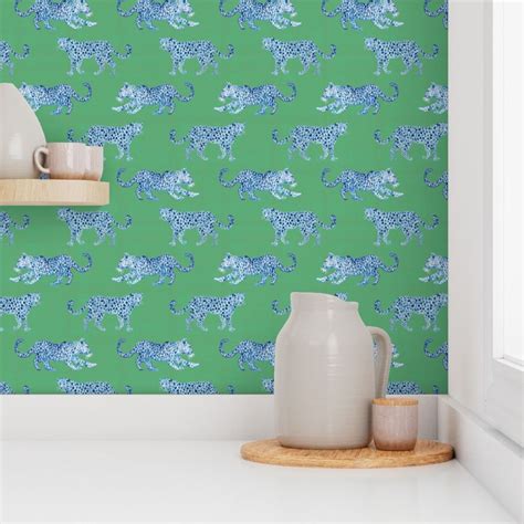 Leopard Parade Blue On Celadon Wallpaper Spoonflower