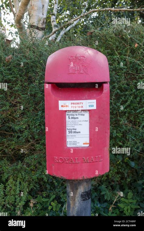 Royal Mail Post Box On Pole With Nhs Priority Sticker In The Devon