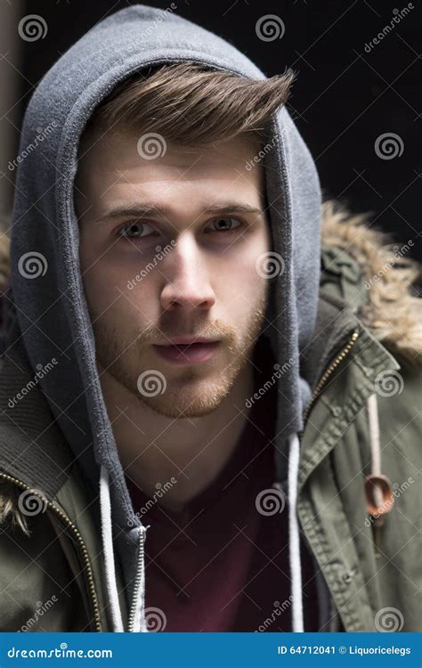 Portrait Of A Young Man With His Hood Up Stock Image Image Of Weather