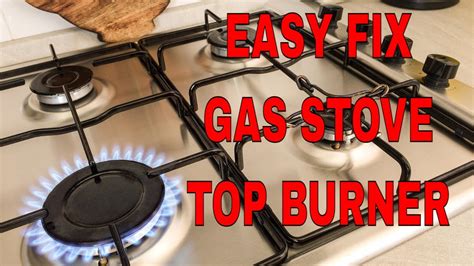 how to repair a gas stove top burner an easy fix youtube