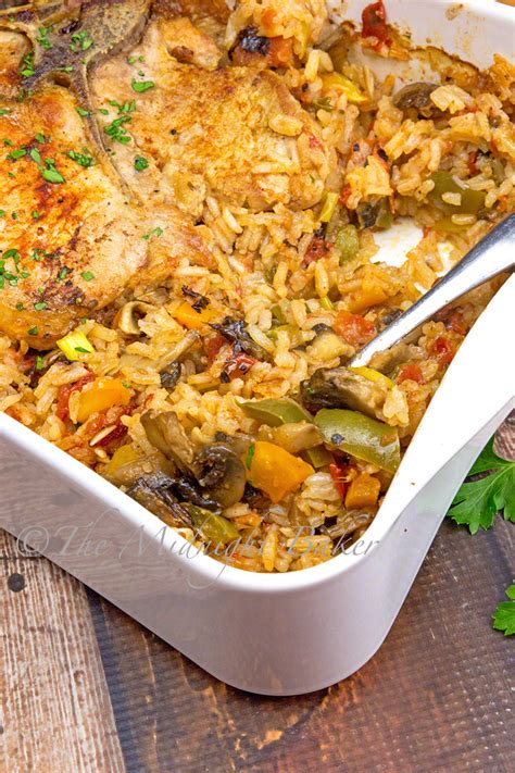 This is a rice side dish recipe for four people who are going to have roasted pork for dinner. Pork Chops with Loaded Vegetable Rice - The Midnight Baker