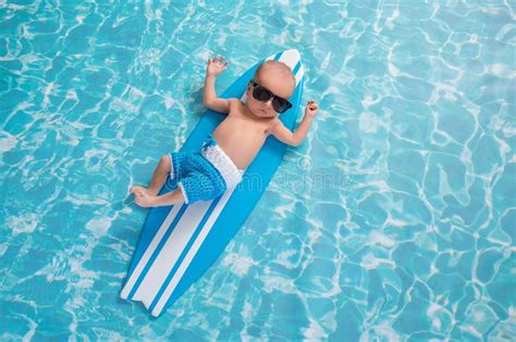 Newborn Baby Boy Surfboard Stock Photos Free And Royalty Free Stock