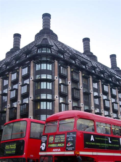 Free Stock Photo Of Red Buses In Front Portcullis House In Westminster