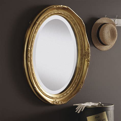 An oval bathroom mirror with an ornate metal frame will cast a timeless silhouette. YG0824 Small Decorative Oval Wall Mirror that is also ...