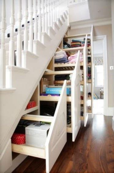 A chest of drawers with a seasonal display of flowers would probably fit. Tiny House Furniture Fridays #22: Staircase Storage, Beds & Desks