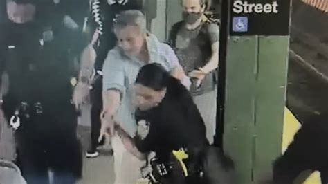 nyc subway crime video shows good samaritan intervene as woman attacked on subway platform at