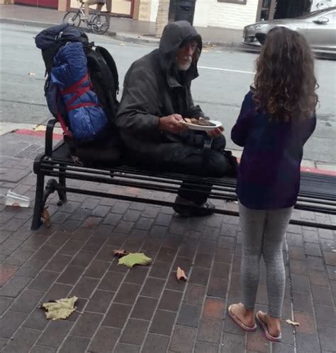 Adorable Moment Young Girl Shares Her Food With Homeless Man Outside