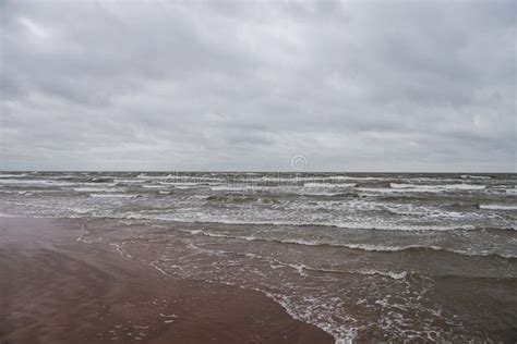 Seaside View Of Baltic Sea Waves On A Cloudy And Stormy Winter Day Near Beach Stock Image