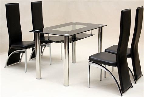 Find a great selection of dining tables for the kitchen and dining room at big lots. Small glass dining table and 4 faux chairs in black ...