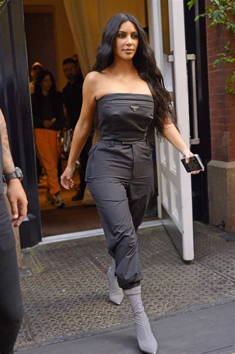 Kim Kardashian Steps Out Of The Mercer Hotel In A Strapless Prada Jumpsuit In New York City
