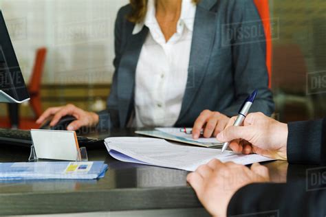 Person Signing Paperwork Mid Section Stock Photo Dissolve