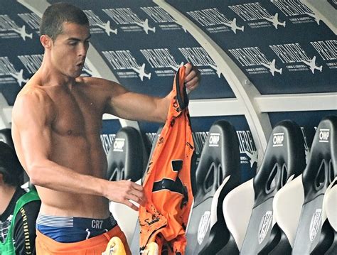 Cristiano Ronaldo Shows Off Abs As He Strips Down To His Underwear
