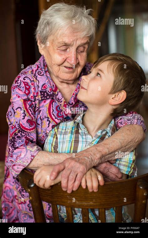Grandmother Hugging Her Little Grandson Stock Photo Alamy