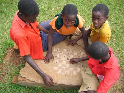 Pin By Jan Ferrar On Diy Toys African Children Kids Playing Diy Toys
