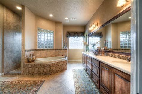 Lightly Decorated Master Bath With Plenty Of Open Space And Hidden Walk In Shower Behind The