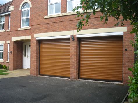 Double skinned aluminium roller doors are generally constructed with slats around 77mm deep and 20mm thick. Roller Shutter Doors : Garage Door Range : Birmingham ...