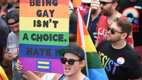 lgbtq community marches for equal rights and to stand up against donald trump