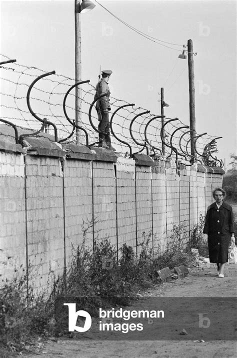 Image Of Views Of The Berlin Wall With Soldiers Patrolling October 1961