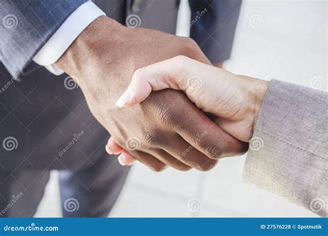 African American Businessman And Woman Shaking Hands Stock Photo Image