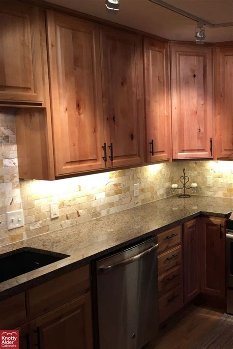 We've already seen examples where wood is in the modern kitchen but isn't necessarily part of the color scheme itself. Knotty Alder Cabinets | Natural Stain Kitchen Cabinets ...